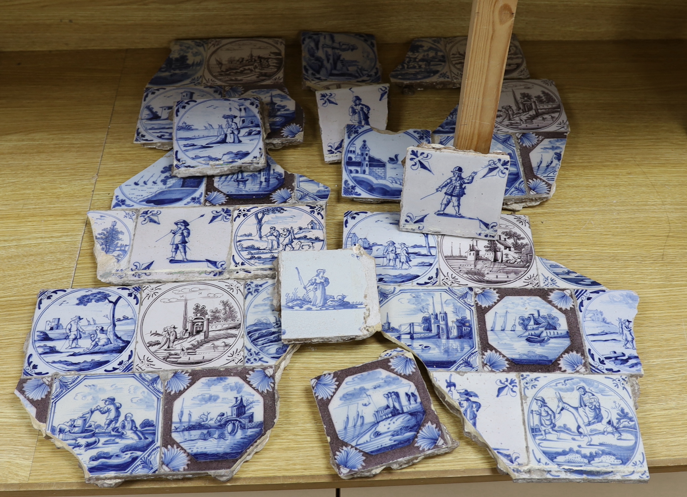 A collection of 18th century Delft Blue and white or manganese tiles (a.f.)